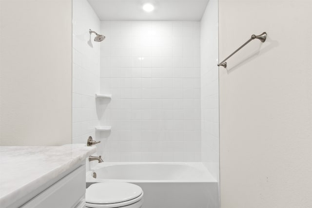 full bath with shower / bathing tub combination, vanity, and toilet