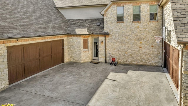 view of patio featuring a garage