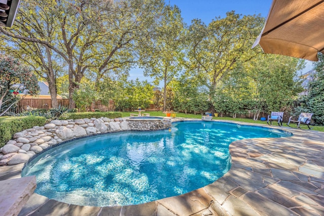 view of pool featuring a patio