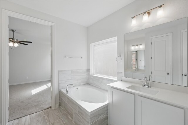 5036 Water Lily Ln, Fort Worth, TX 76036 - full bathroom featuring ceiling fan, a bath, and vanity
