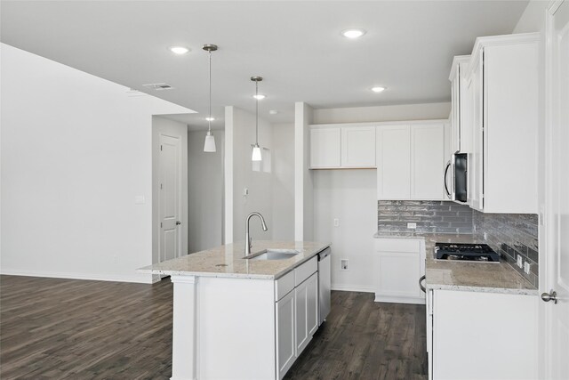 5036 Water Lily Ln, Fort Worth, TX 76036 - kitchen featuring a sink, visible vents, white cabinetry, and stainless steel appliances