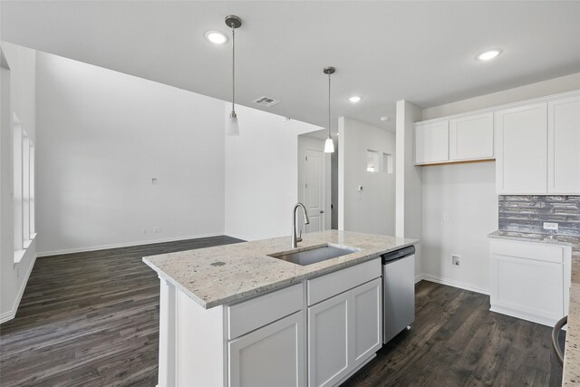 5036 Water Lily Ln, Fort Worth, TX 76036 - kitchen with visible vents, white cabinetry, dark wood-style flooring, a sink, and stainless steel dishwasher