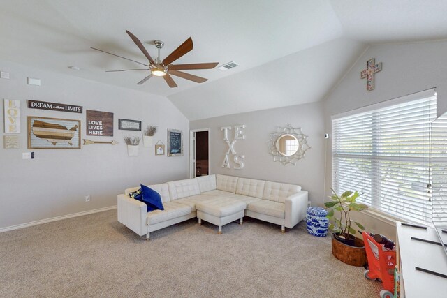 staircase with a chandelier, carpet floors, and a healthy amount of sunlight