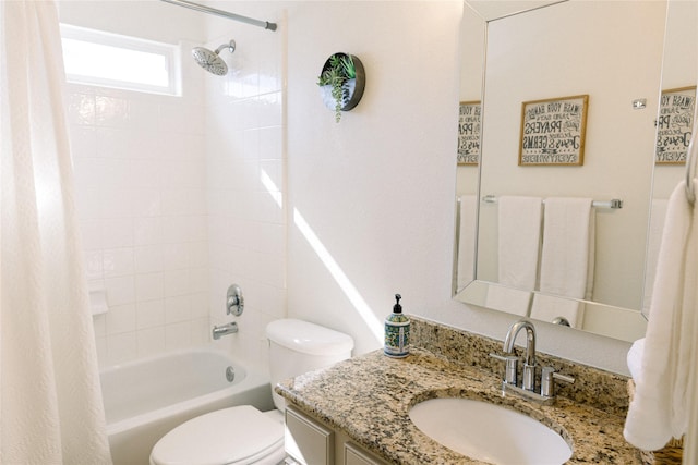 full bathroom with vanity, toilet, and shower / bath combo