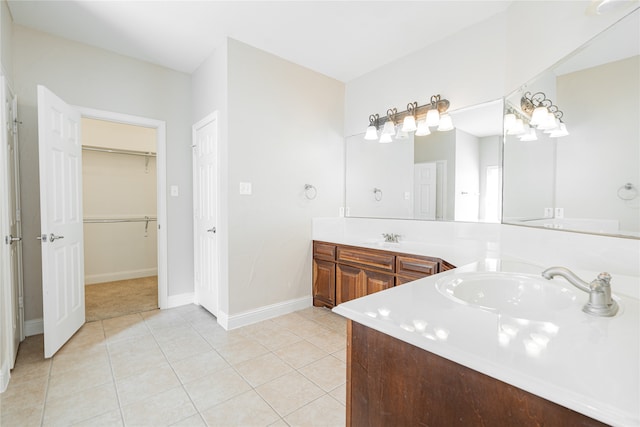 bathroom with tile patterned floors and vanity