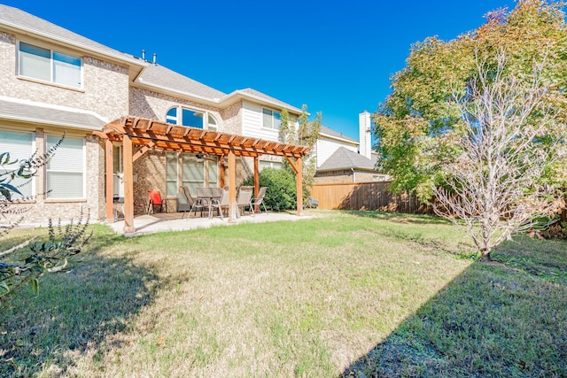 view of yard with a patio area and a pergola