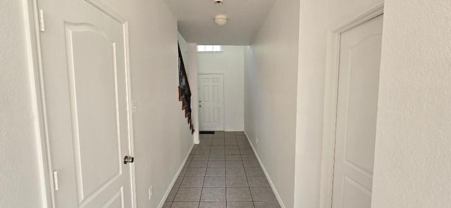 corridor featuring tile patterned flooring