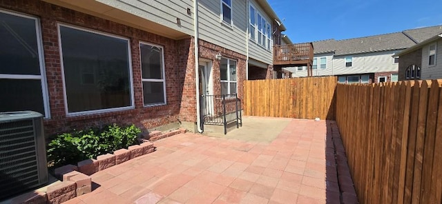 view of patio featuring central AC unit