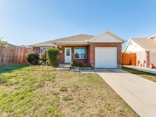 ranch-style home with a front lawn and a garage