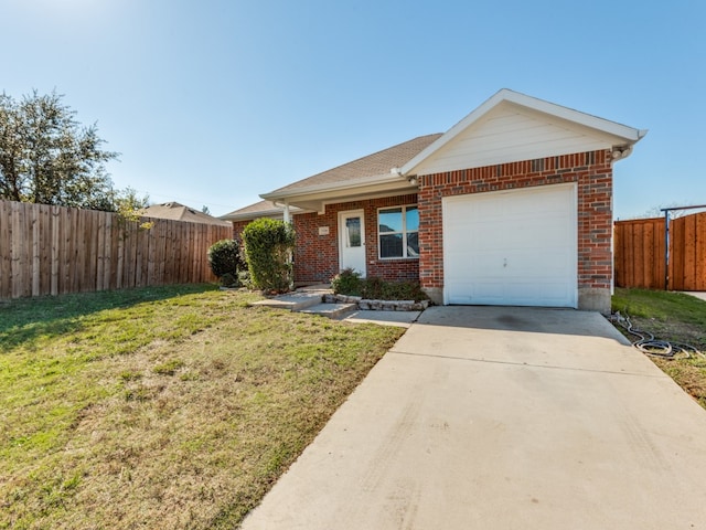 ranch-style house featuring a garage and a front lawn