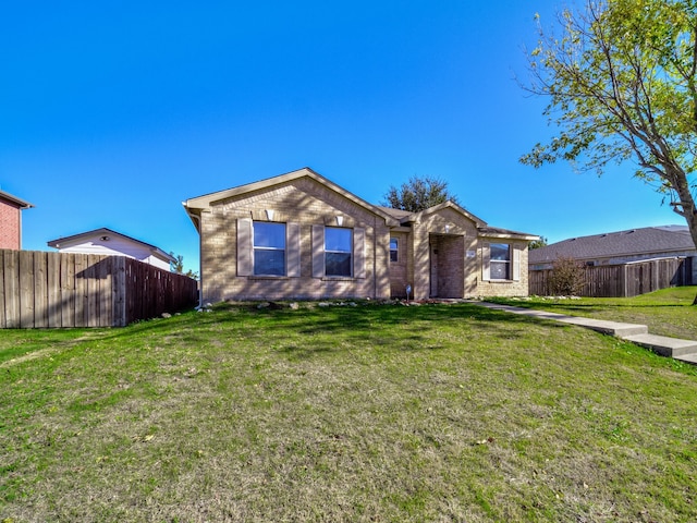 ranch-style house with a front yard