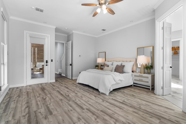 bedroom featuring light hardwood / wood-style floors, ceiling fan, and crown molding