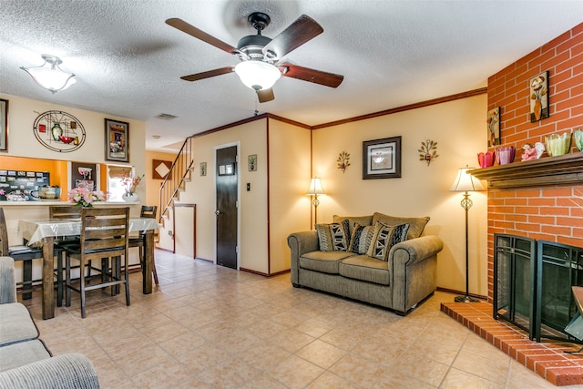 living room with a textured ceiling and ornamental molding