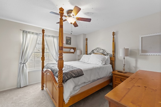 bedroom featuring light carpet and ceiling fan