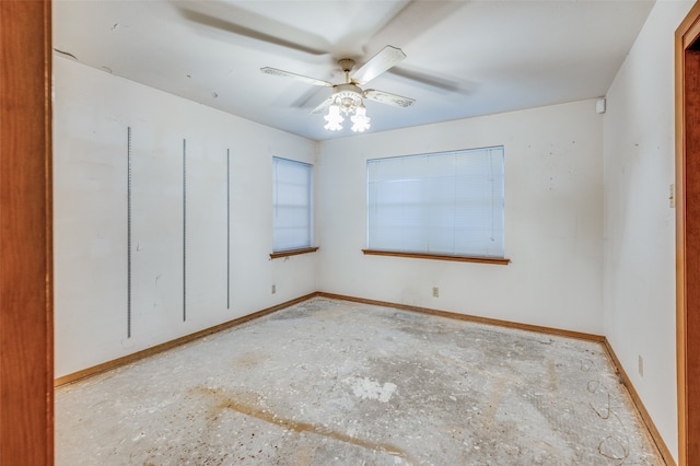 spare room with ceiling fan