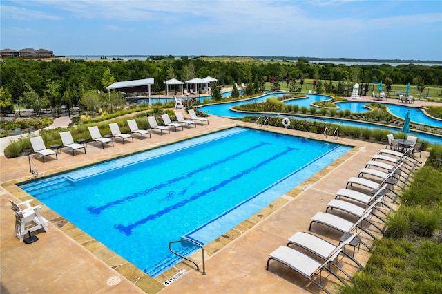 view of pool featuring a patio area