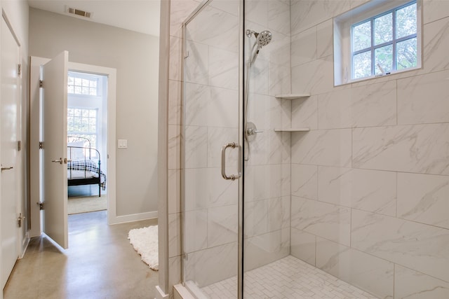 bathroom featuring an enclosed shower