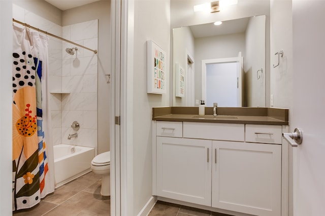 full bathroom featuring tile patterned floors, vanity, toilet, and shower / tub combo with curtain