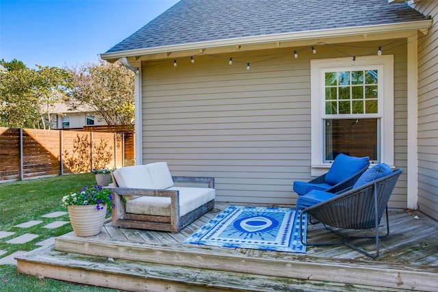 wooden deck featuring outdoor lounge area