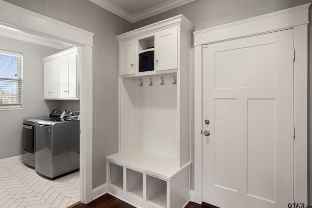 mudroom with washer and dryer and crown molding