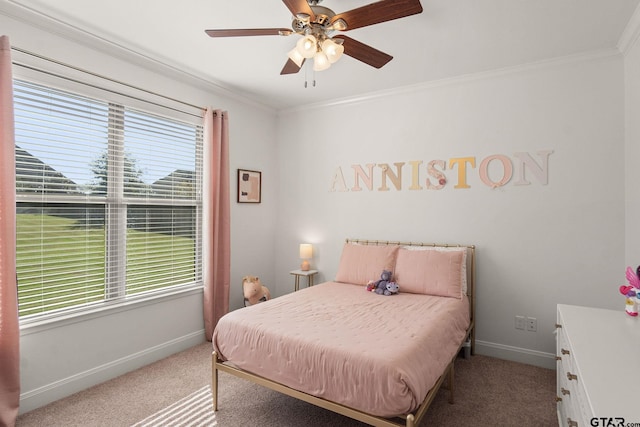 carpeted bedroom featuring multiple windows, crown molding, and ceiling fan