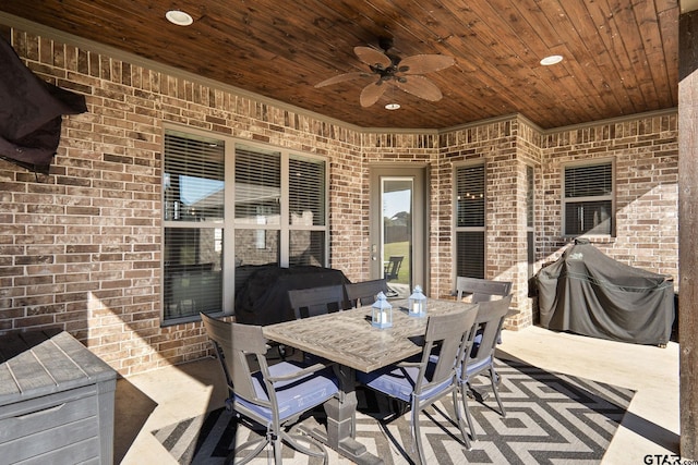 view of patio / terrace featuring ceiling fan