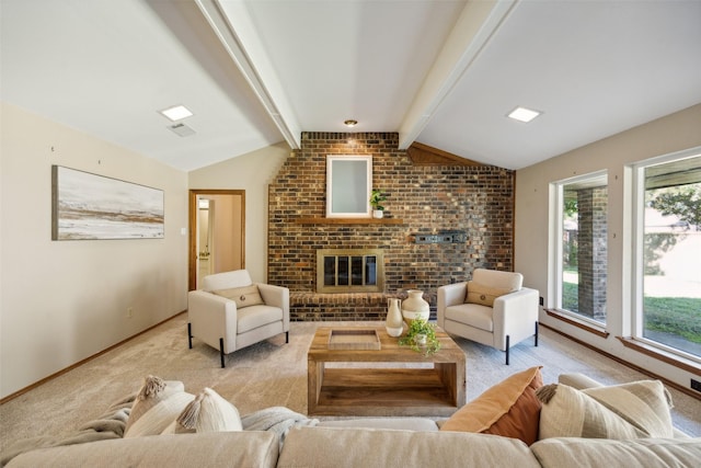 living room featuring lofted ceiling with beams, light colored carpet, a wealth of natural light, and brick wall