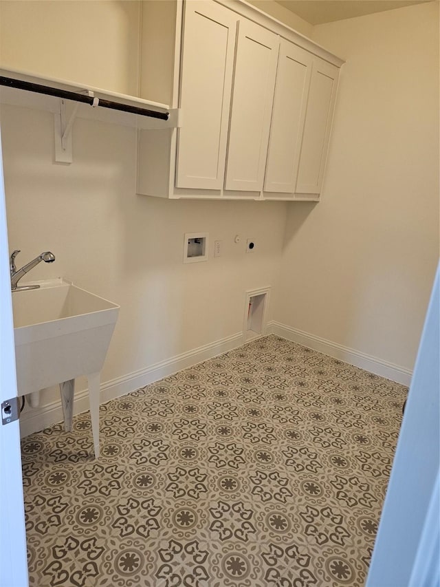 washroom featuring cabinets, hookup for a washing machine, and electric dryer hookup