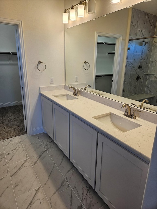 bathroom featuring vanity and a shower with shower door