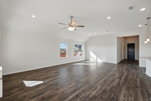 unfurnished living room featuring lofted ceiling, ceiling fan, dark wood-type flooring, and recessed lighting