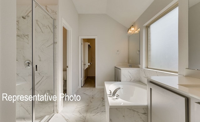 full bathroom featuring vanity, toilet, lofted ceiling, and shower with separate bathtub