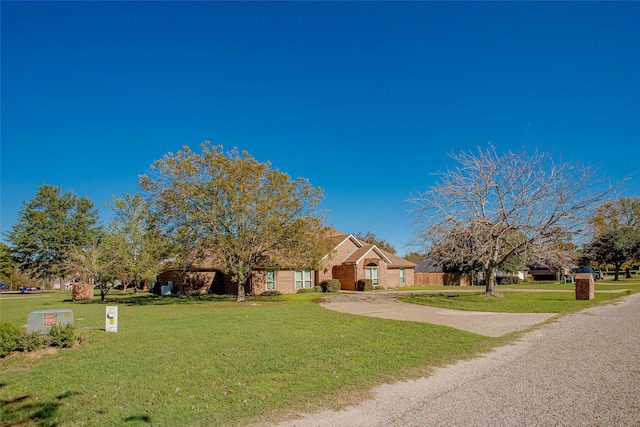 view of front of home with a front lawn