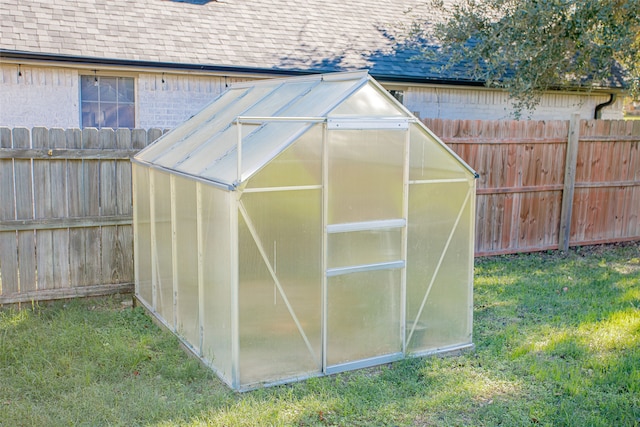 view of outdoor structure featuring a yard