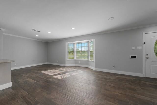 interior space with crown molding and dark hardwood / wood-style floors