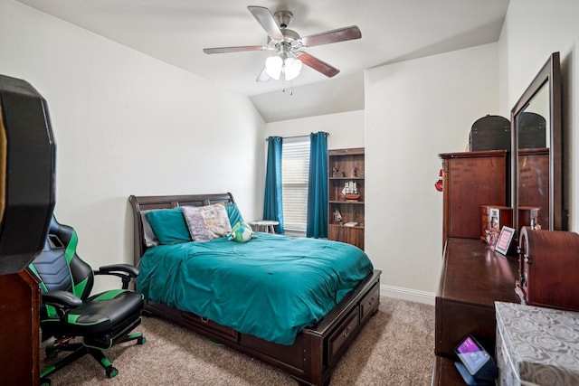 bedroom with carpet, vaulted ceiling, and ceiling fan