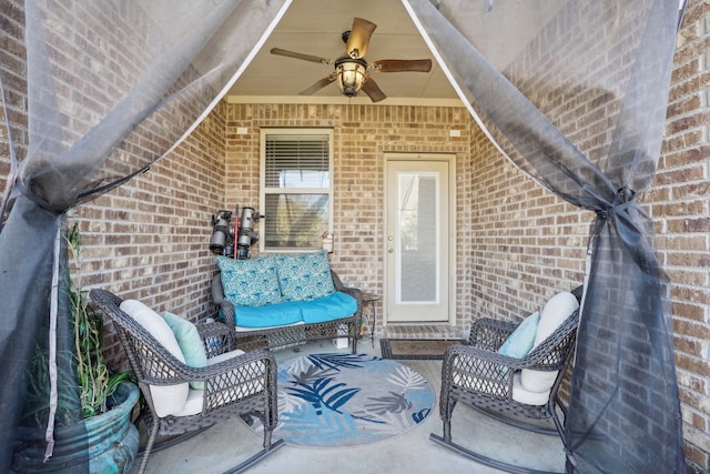 view of patio / terrace featuring ceiling fan