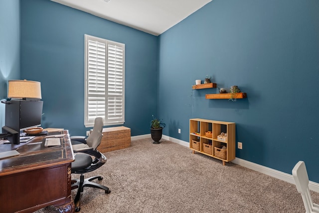 carpeted office with baseboards