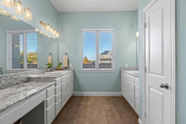1100 Wedgewood Dr, Forney, TX 75126 - bathroom with vanity, baseboards, and tile patterned flooring