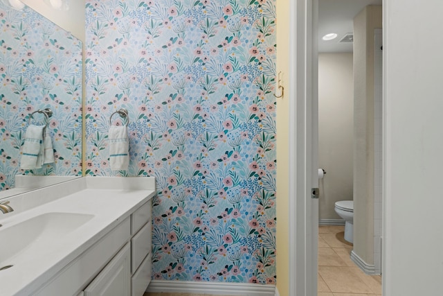 1100 Wedgewood Dr, Forney, TX 75126 - full bathroom featuring tile patterned floors, toilet, vanity, and baseboards