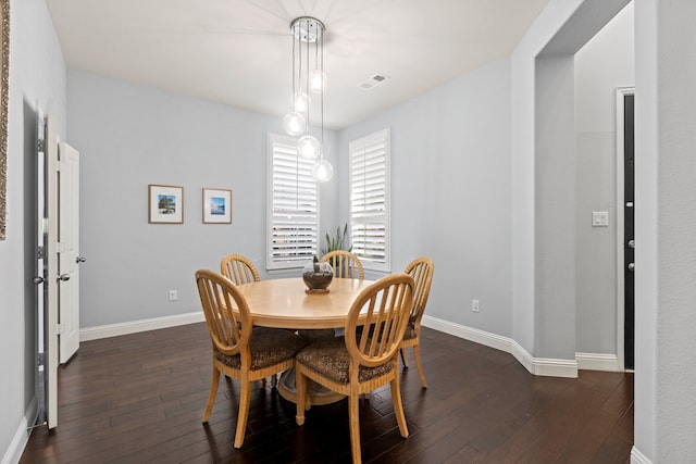 1100 Wedgewood Dr, Forney, TX 75126 - dining area with dark wood-type flooring and baseboards