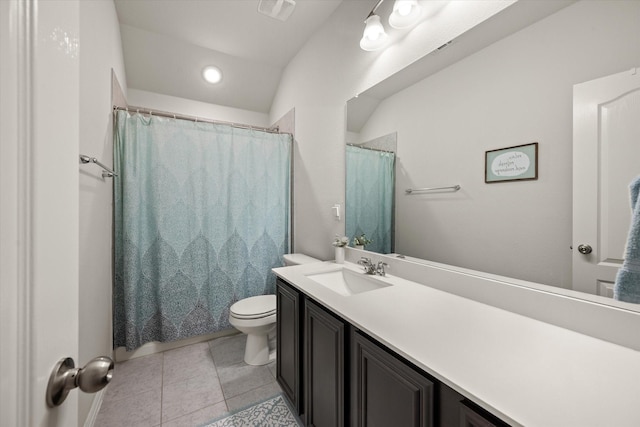 bathroom featuring toilet, vanity, tile patterned flooring, and curtained shower