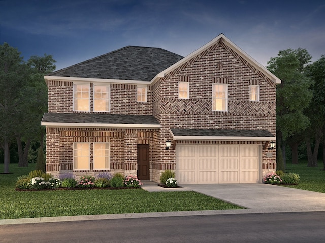 view of front property with a garage and a front lawn