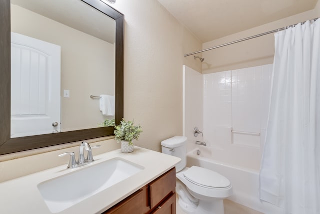 full bathroom featuring shower / bath combo, toilet, and vanity