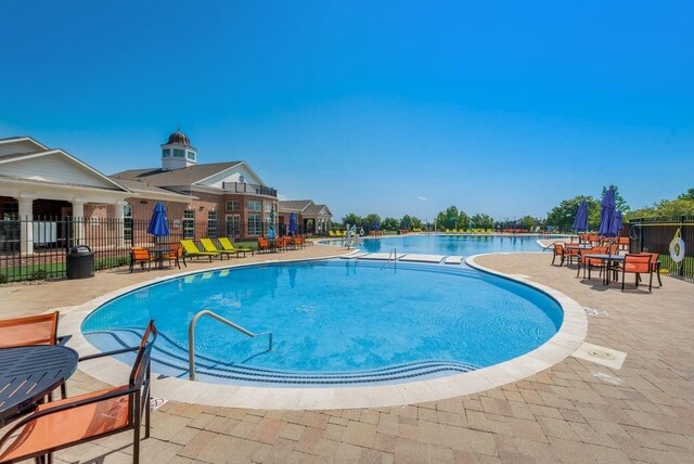 view of pool with a patio area