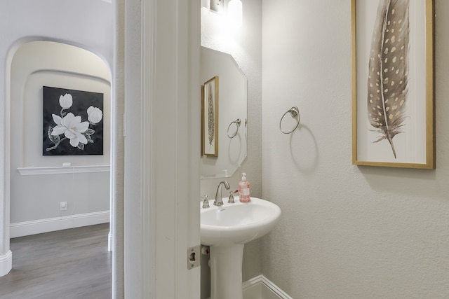 bathroom featuring hardwood / wood-style floors and sink