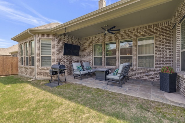 view of patio / terrace with outdoor lounge area, grilling area, and ceiling fan