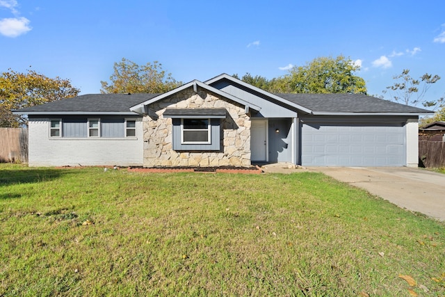 ranch-style house with a front lawn and a garage