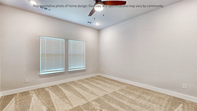 empty room with carpet and ceiling fan