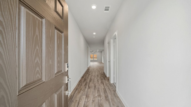 hallway featuring light wood-type flooring