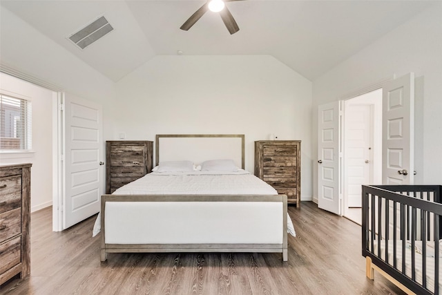 1321 Shire Dr, Aubrey, TX 76227 - bedroom featuring vaulted ceiling, a ceiling fan, visible vents, and light wood-style flooring